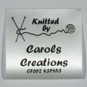 Custom printed Knitting label. Black print on Silvery White material