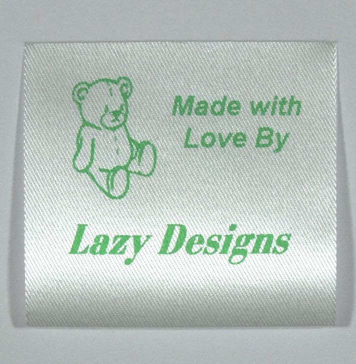 Sew-in Soft toy label printed in Green on Satin type soft material