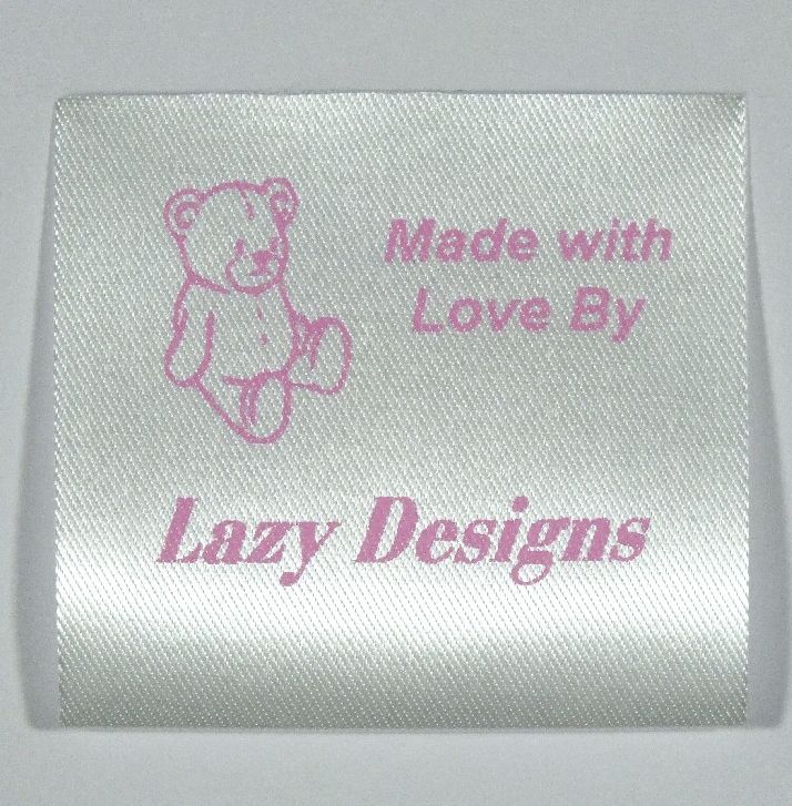 Sew-in Soft toy label printed in Pink on Satin type soft material