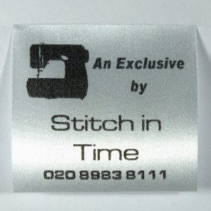 Sew in Garment label with a sewing machine logo ideal as Tailors labels. Printed especially for you on soft satin-like fabric.