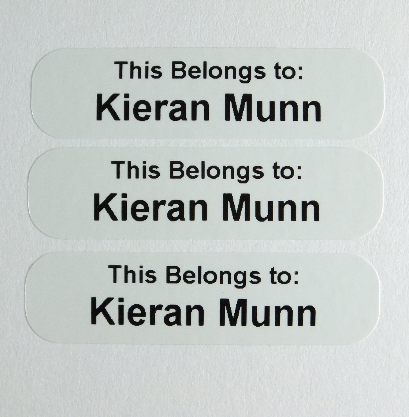 Made from a white Polymer Material these name Tags will withstand wear and tear.