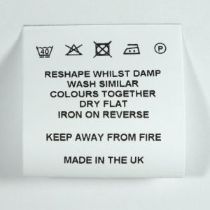 Harsh environment 40mm loop fold care labels for workwear and sports kit.