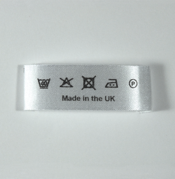 45mm wide end sewn washcare label printed Black.